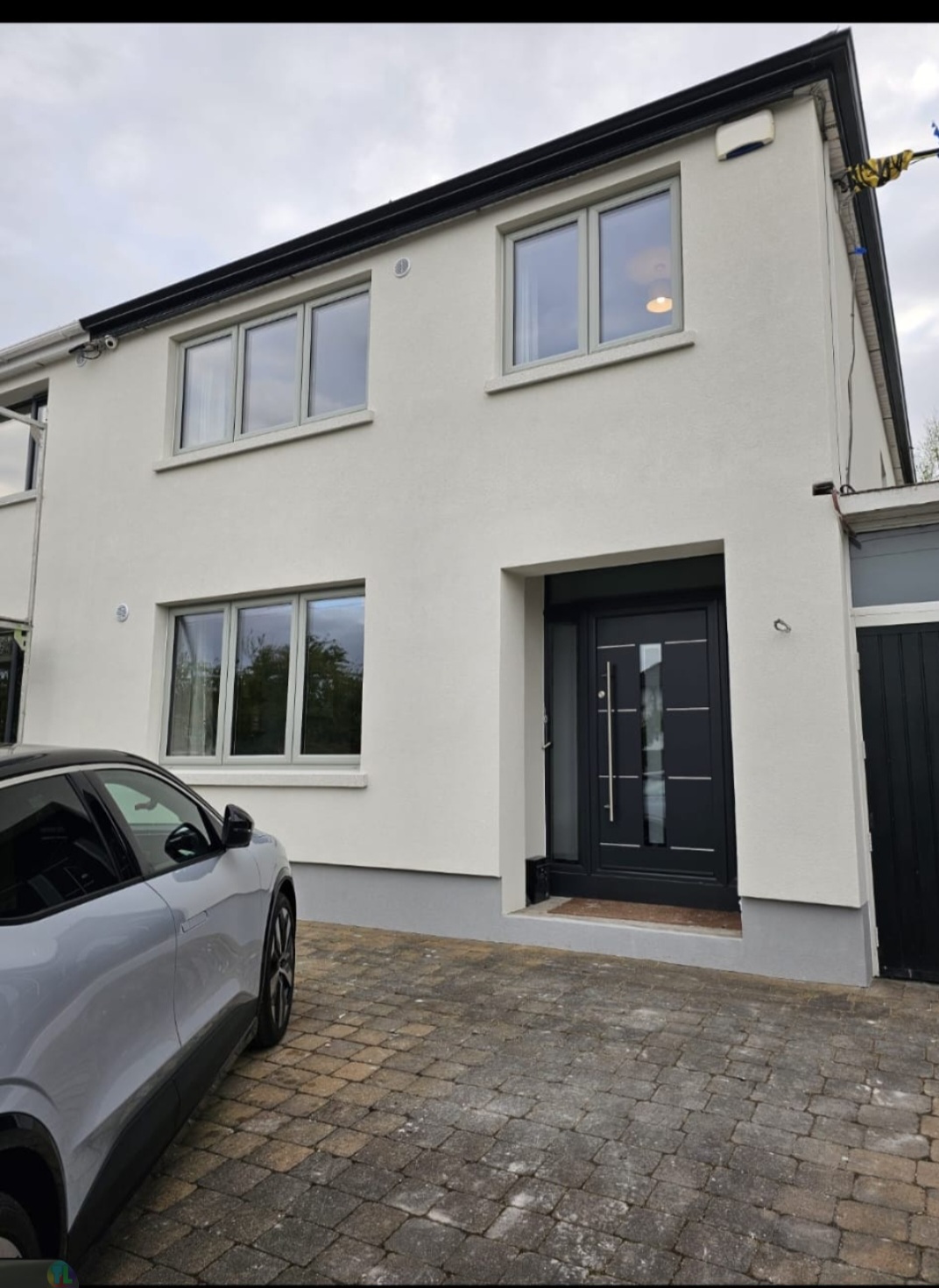 Finished cream external wrap front elevation